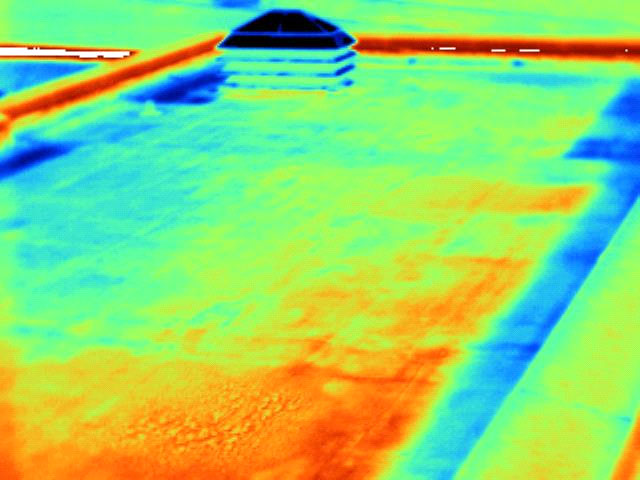 Infrared thermal scan showing wet insulation heat retention signatures